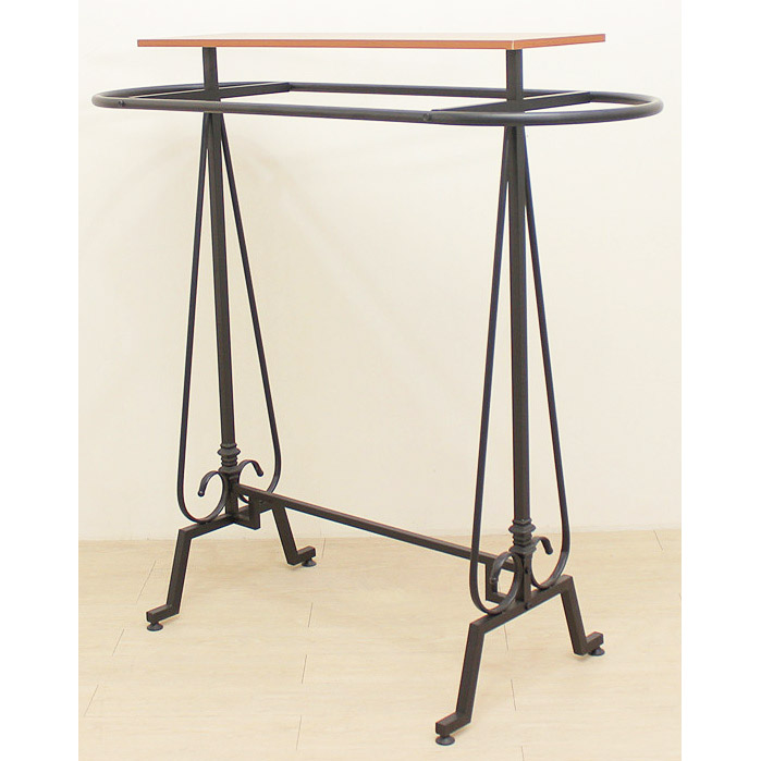 Black clothing display rack with wood table top