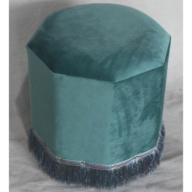 Hexagonal ottoman with tassels